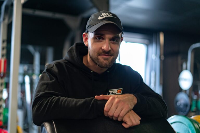 portrait on the preacher curl machine